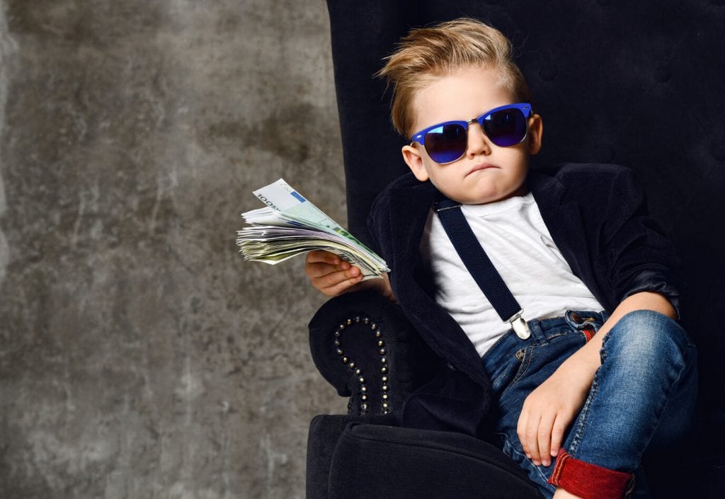 Want To Buy An Arcade Machine? Read This 1 Kid sitting with wad of cash