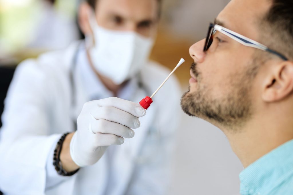 Graphics Cards Are Too Expensive and We Need to Talk About It (Again) 1 A doctor prepares to give a patient a nose swab for COVID-19