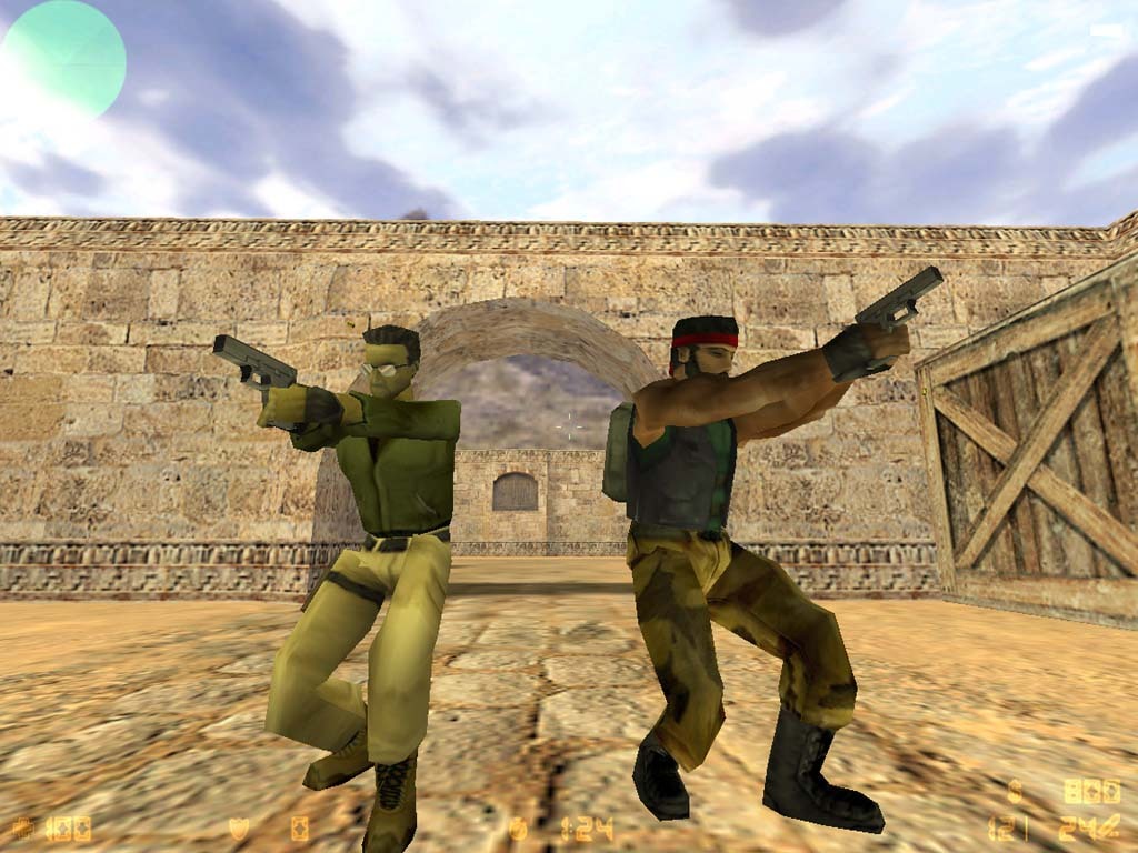 Two counter-terrorist players face off in a desert map in classic Counter-Strike