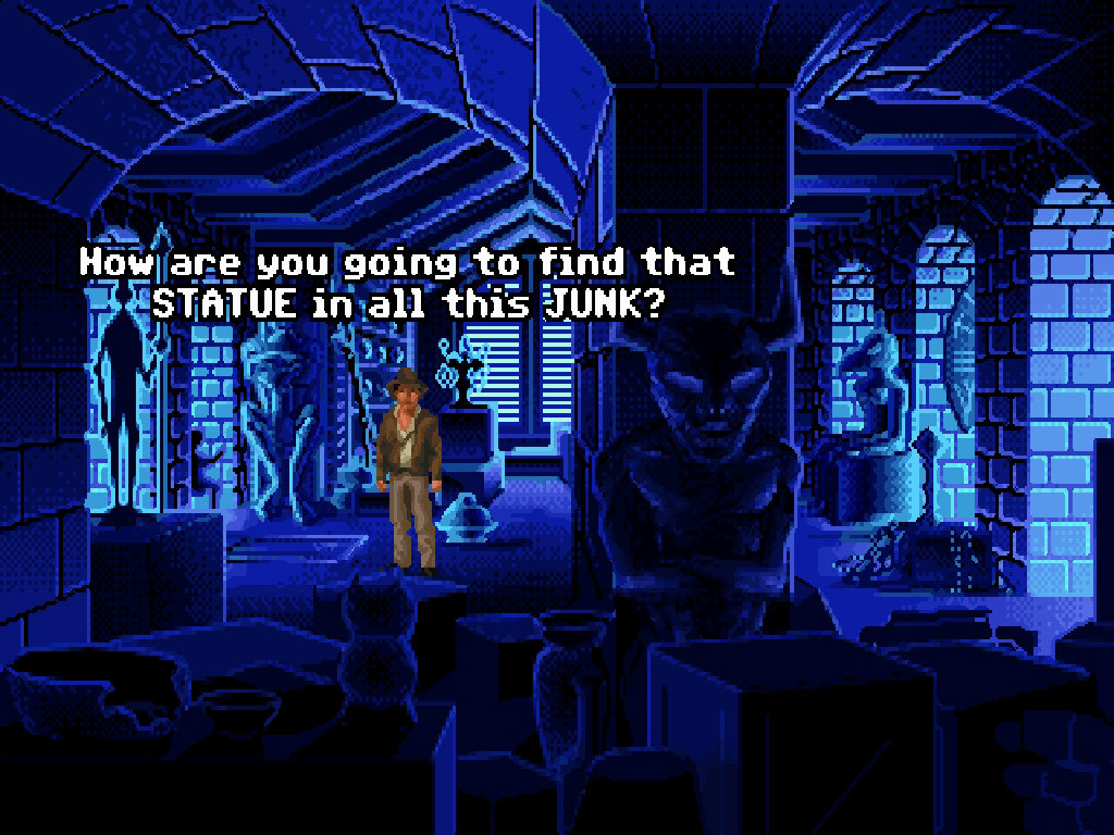 Indiana Jones explores a dark skeleton strewn ruin in Indiana Jones and the Fate of Atlantis
