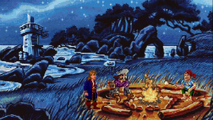 Guybrush Threepwood stands apart from a campfire gathering of pirates on a moonlit beach in Monkey Island 2: LeChuck's Revenge