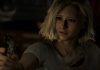 Resident Evil: Requiem Review Grace holds a gun looking scared in Resident Evil: Requiem